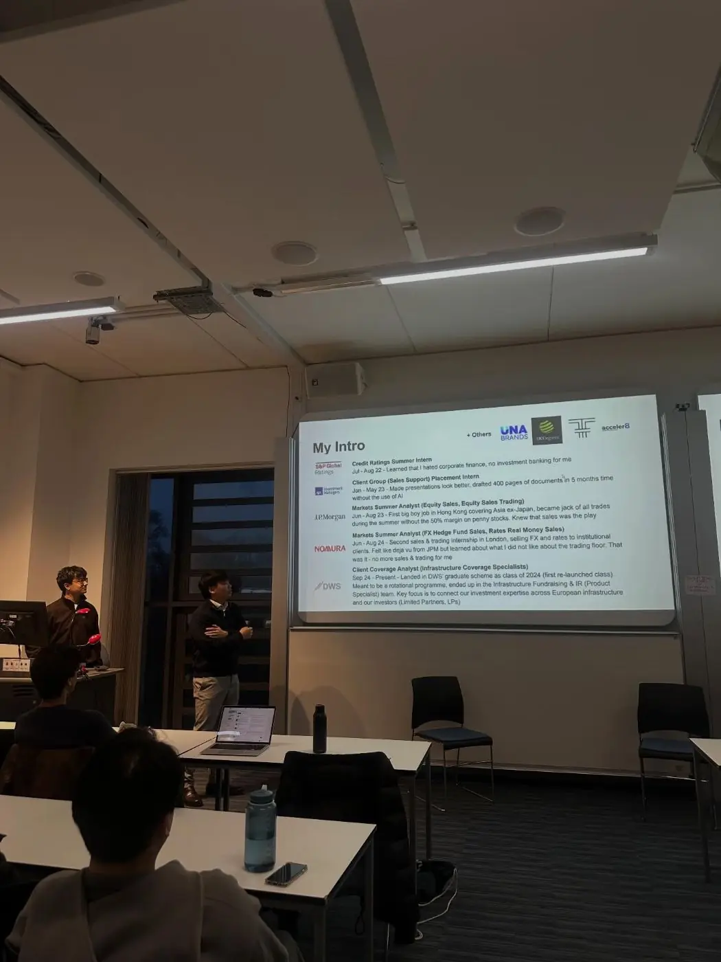 A speaker presenting an introduction slide to SOBIC members in a lecture theatre